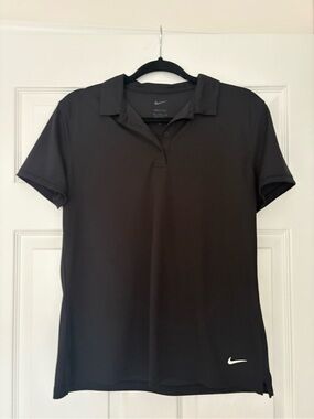 Nike Women’s Black Polo Shirt with White Swoosh